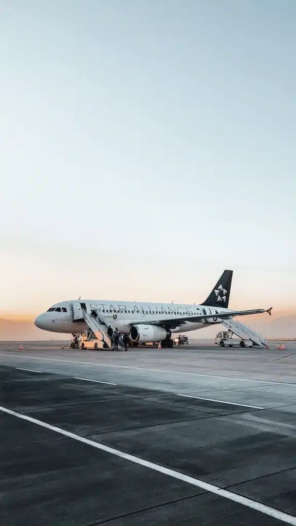 Airplane on ground of airport at daytime
