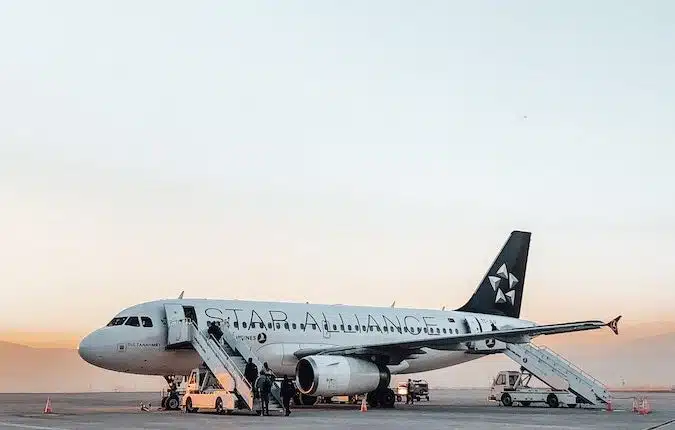 Airplane on ground of airport at daytime